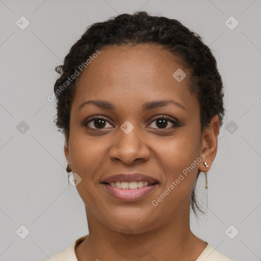 Joyful latino young-adult female with short  brown hair and brown eyes