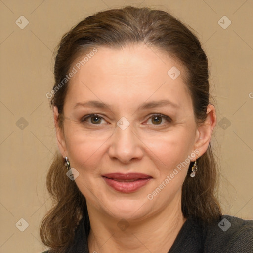 Joyful white adult female with medium  brown hair and grey eyes