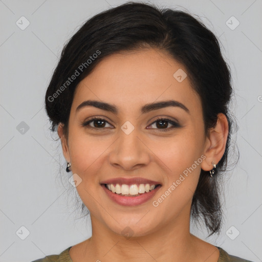 Joyful latino young-adult female with medium  brown hair and brown eyes