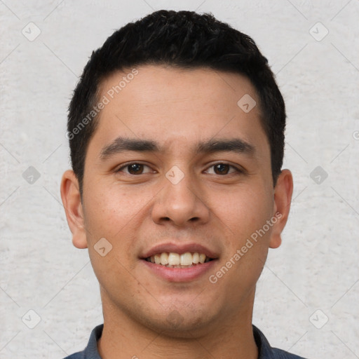 Joyful white young-adult male with short  black hair and brown eyes