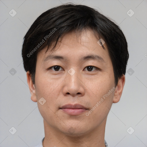 Neutral asian young-adult male with short  brown hair and brown eyes