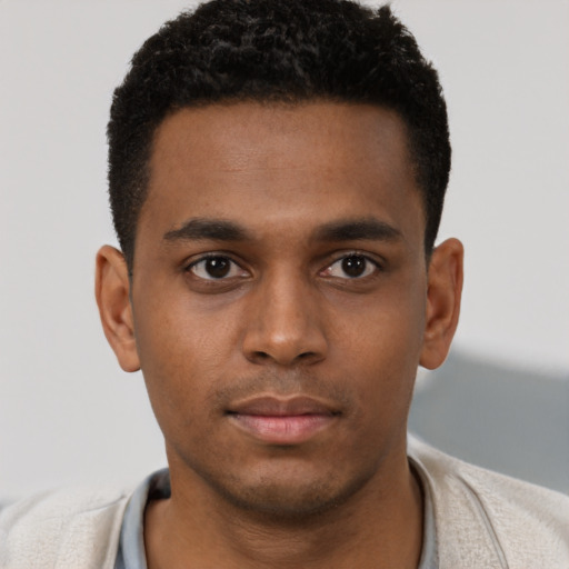 Neutral black young-adult male with short  brown hair and brown eyes