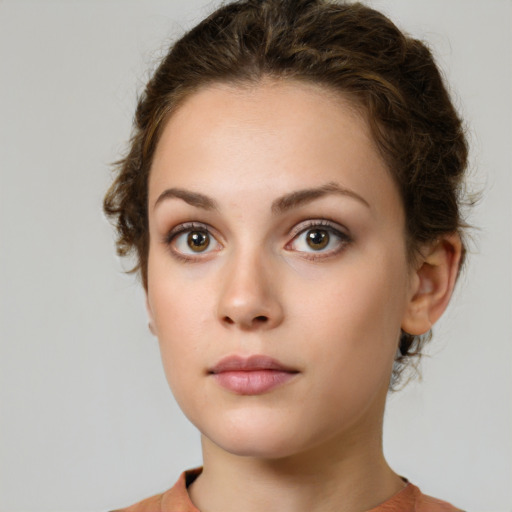 Neutral white young-adult female with short  brown hair and brown eyes