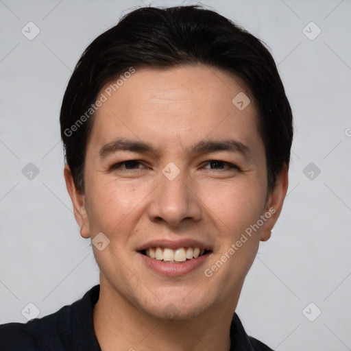 Joyful white young-adult male with short  black hair and brown eyes