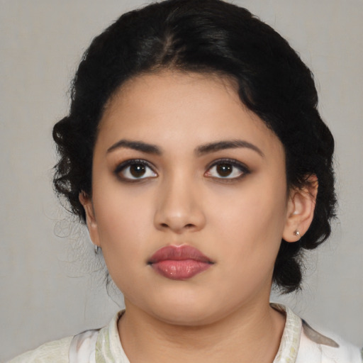 Neutral latino young-adult female with medium  black hair and brown eyes