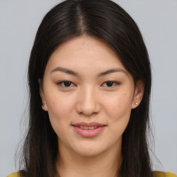 Joyful asian young-adult female with medium  brown hair and brown eyes