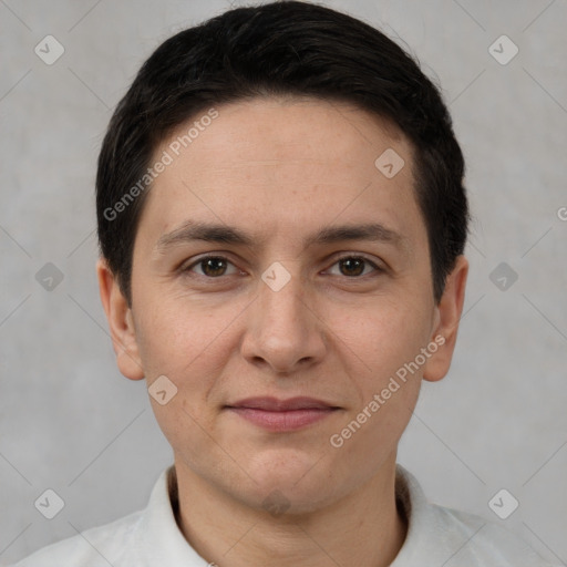 Joyful white adult male with short  brown hair and brown eyes