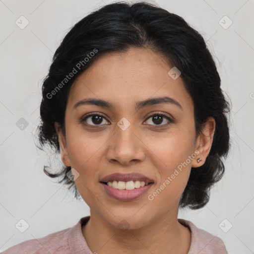 Joyful latino young-adult female with medium  black hair and brown eyes