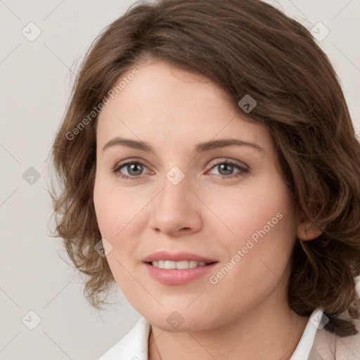 Joyful white young-adult female with medium  brown hair and green eyes