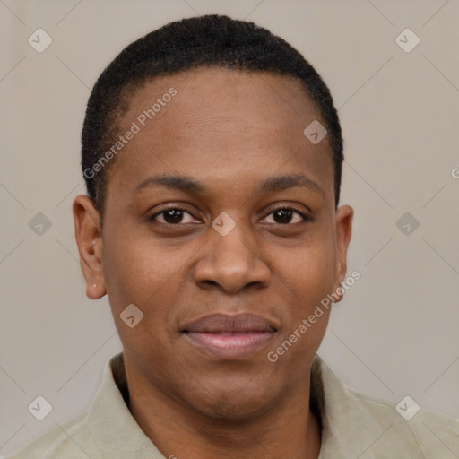Joyful black young-adult female with short  black hair and brown eyes