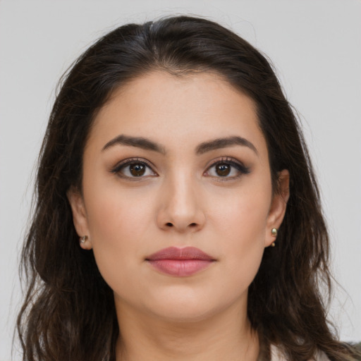 Neutral white young-adult female with long  brown hair and brown eyes