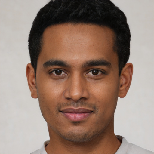 Neutral black young-adult male with short  black hair and brown eyes