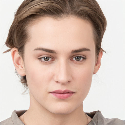 Neutral white young-adult female with medium  brown hair and grey eyes