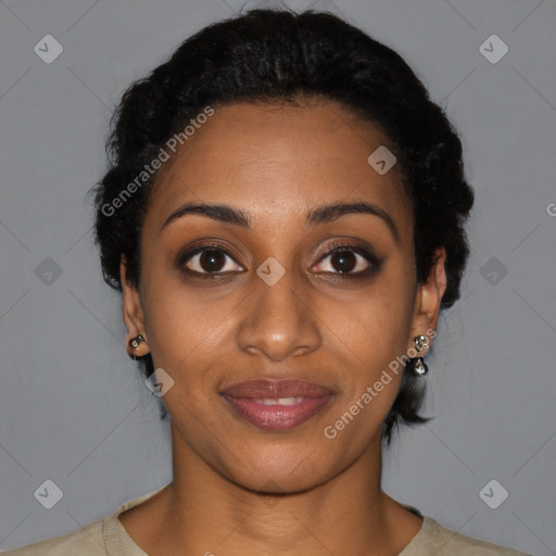 Joyful black young-adult female with short  black hair and brown eyes