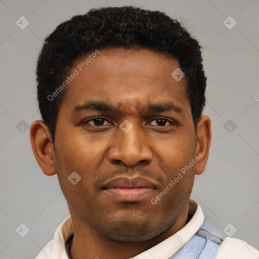 Neutral latino young-adult male with short  brown hair and brown eyes
