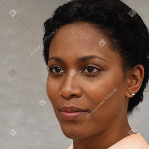 Neutral black young-adult female with short  black hair and brown eyes