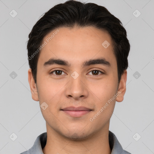 Joyful white young-adult male with short  black hair and brown eyes