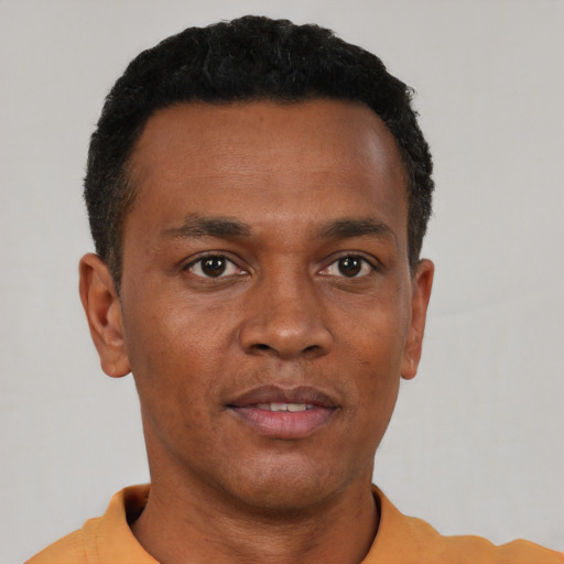 Neutral black young-adult male with short  brown hair and brown eyes