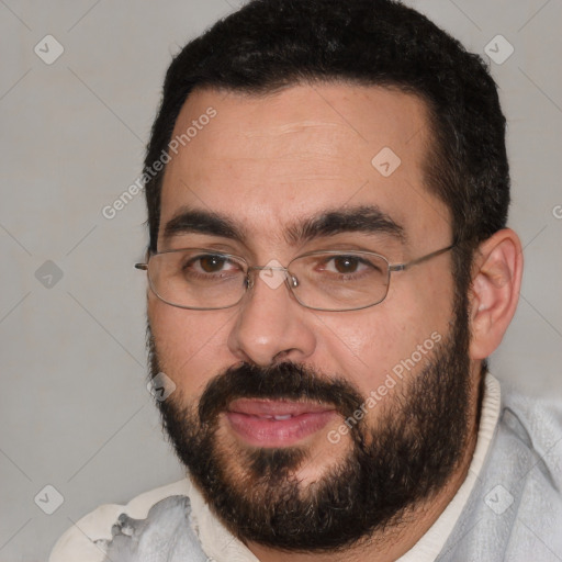 Joyful white young-adult male with short  black hair and brown eyes