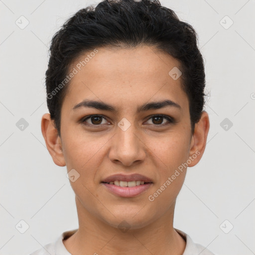 Joyful latino young-adult female with short  brown hair and brown eyes