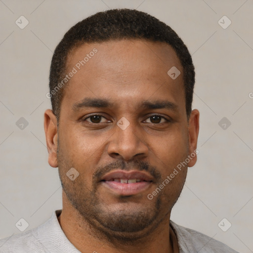 Neutral latino young-adult male with short  brown hair and brown eyes