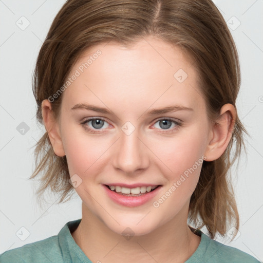 Joyful white young-adult female with medium  brown hair and blue eyes