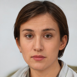 Neutral white young-adult female with short  brown hair and brown eyes