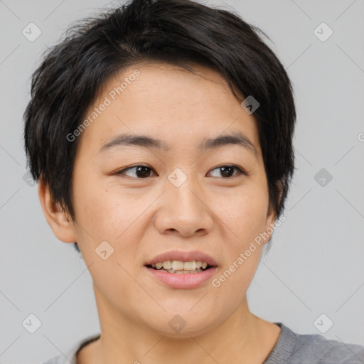 Joyful asian young-adult female with short  brown hair and brown eyes