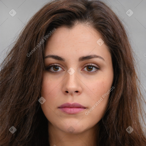 Neutral white young-adult female with long  brown hair and brown eyes