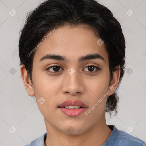 Joyful latino young-adult female with medium  brown hair and brown eyes