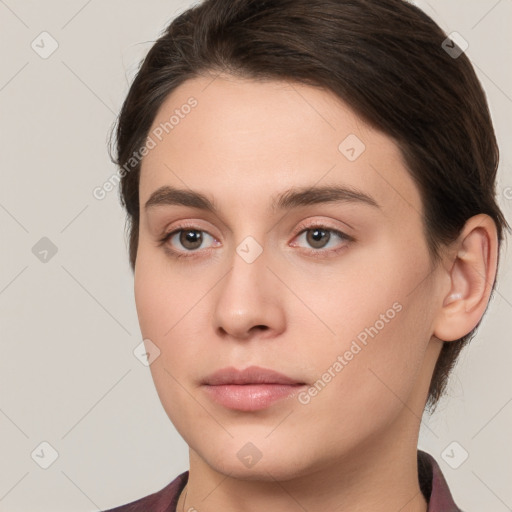 Neutral white young-adult female with medium  brown hair and brown eyes