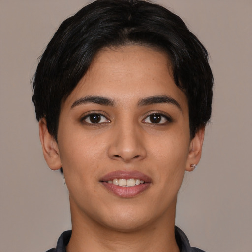 Joyful asian young-adult female with short  black hair and brown eyes