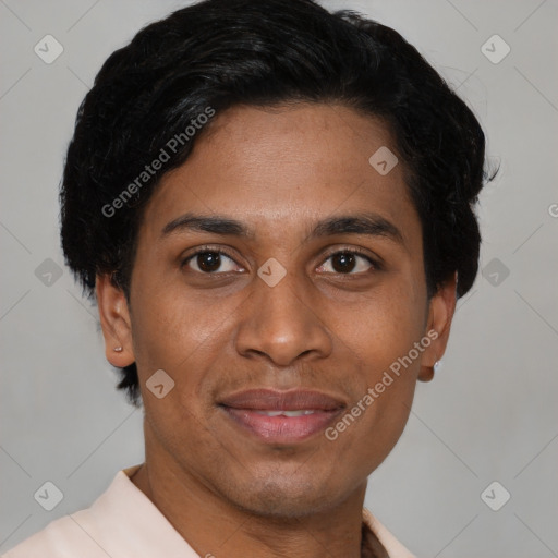Joyful latino young-adult male with short  brown hair and brown eyes