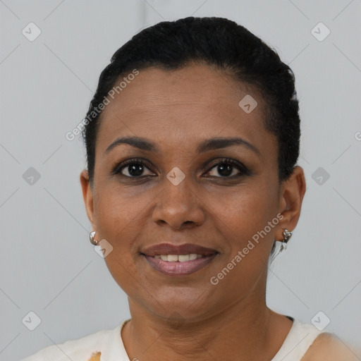 Joyful black young-adult female with short  black hair and brown eyes