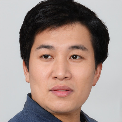 Neutral asian young-adult male with short  black hair and brown eyes