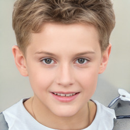 Joyful white child male with short  brown hair and brown eyes