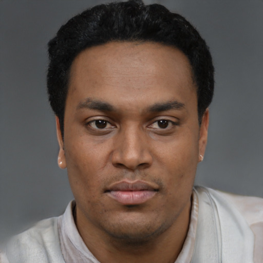 Neutral black young-adult male with short  black hair and brown eyes