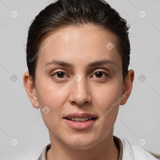 Joyful white young-adult female with short  brown hair and brown eyes