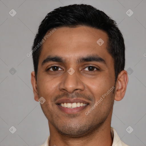 Joyful latino young-adult male with short  black hair and brown eyes