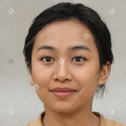 Joyful asian young-adult female with medium  brown hair and brown eyes