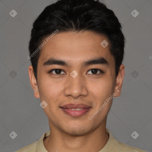 Joyful latino young-adult male with short  black hair and brown eyes