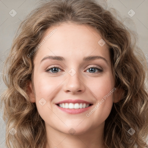 Joyful white young-adult female with medium  brown hair and green eyes