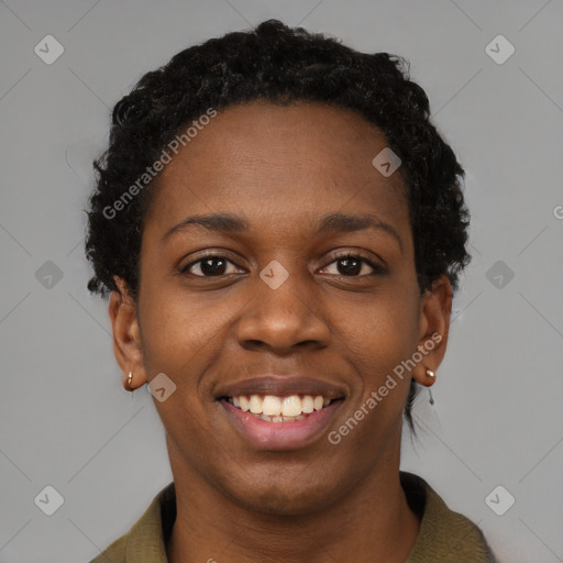 Joyful black young-adult female with short  brown hair and brown eyes