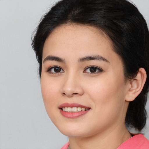 Joyful white young-adult female with medium  brown hair and brown eyes