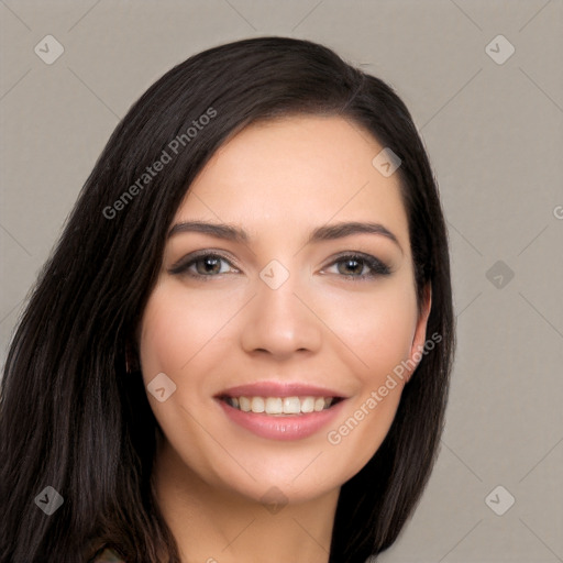 Joyful white young-adult female with long  black hair and brown eyes