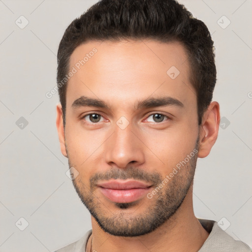 Neutral white young-adult male with short  brown hair and brown eyes