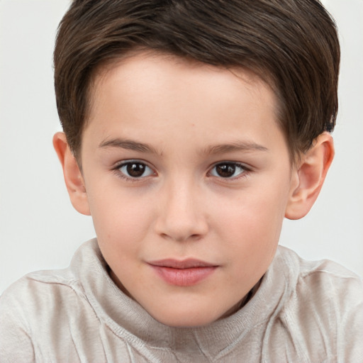 Joyful white child male with short  brown hair and brown eyes