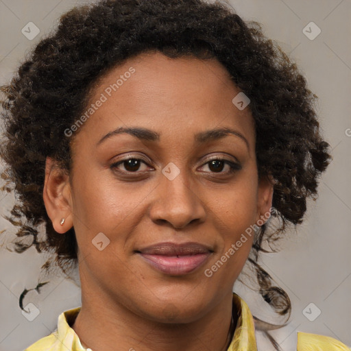 Joyful black young-adult female with medium  brown hair and brown eyes