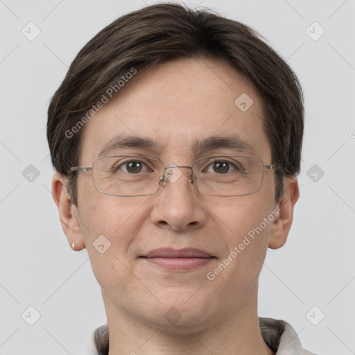 Joyful white adult male with short  brown hair and grey eyes