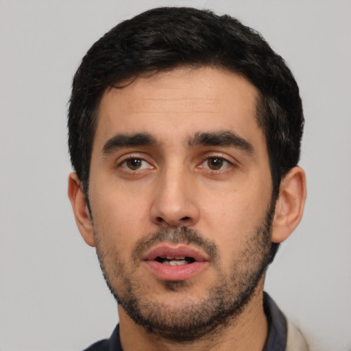 Neutral latino young-adult male with short  black hair and brown eyes